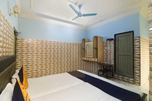 Imagen de la habitación del Hotel Hotel O Maitry. Foto 16