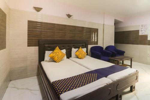 Imagen de la habitación del Hotel Hotel O Maitry. Foto 17