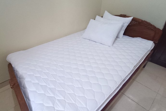 Imagen de la habitación del Hotel Hotel O Penginapan Laras PaminggirNearPesona Alam Seafood Pink Mira. Foto 3