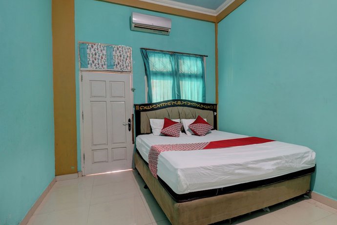Imagen de la habitación del Hotel Hotel O Rania Kost Simpang Rimbo. Foto 2