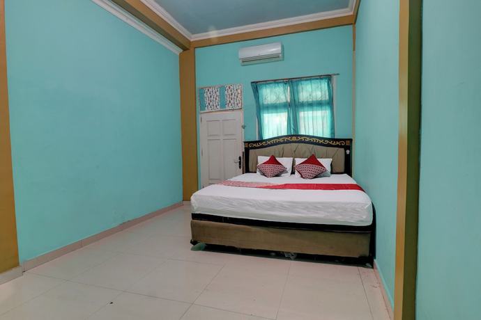 Imagen de la habitación del Hotel Hotel O Rania Kost Simpang Rimbo. Foto 3