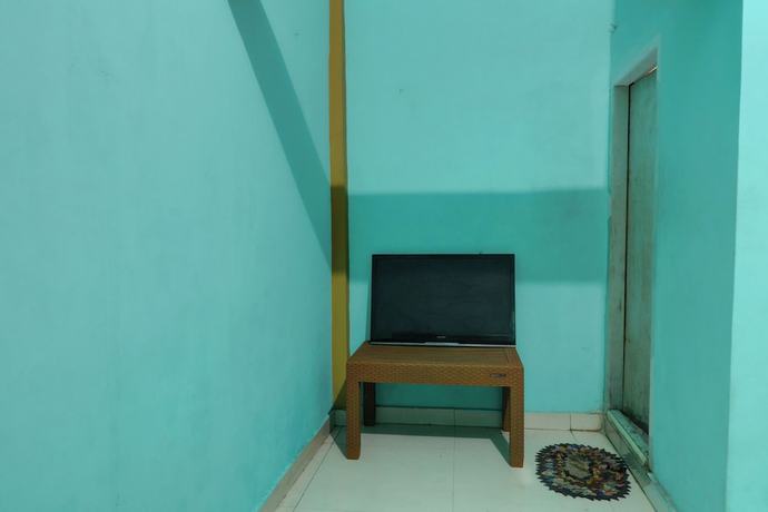 Imagen de la habitación del Hotel Hotel O Rania Kost Simpang Rimbo. Foto 4