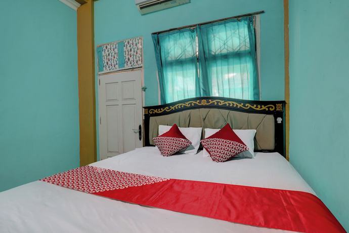 Imagen de la habitación del Hotel Hotel O Rania Kost Simpang Rimbo. Foto 5