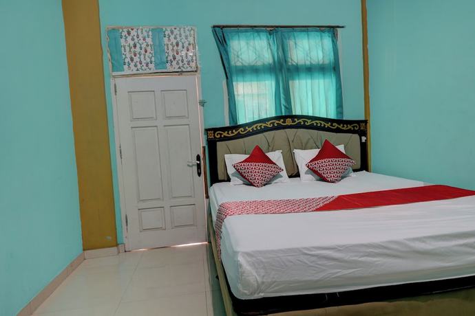 Imagen de la habitación del Hotel Hotel O Rania Kost Simpang Rimbo. Foto 6