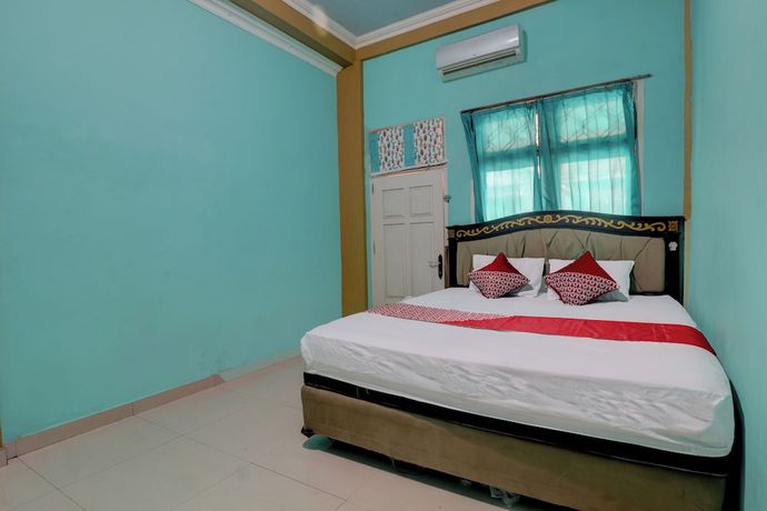Imagen de la habitación del Hotel Hotel O Rania Kost Simpang Rimbo. Foto 7
