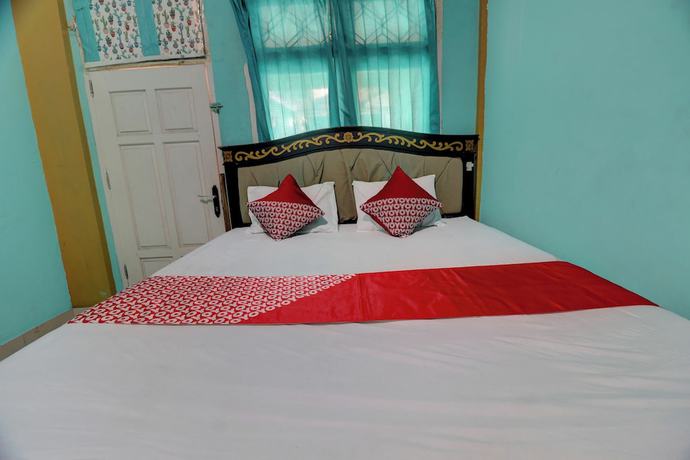 Imagen de la habitación del Hotel Hotel O Rania Kost Simpang Rimbo. Foto 8