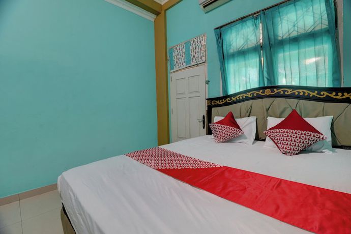 Imagen de la habitación del Hotel Hotel O Rania Kost Simpang Rimbo. Foto 9
