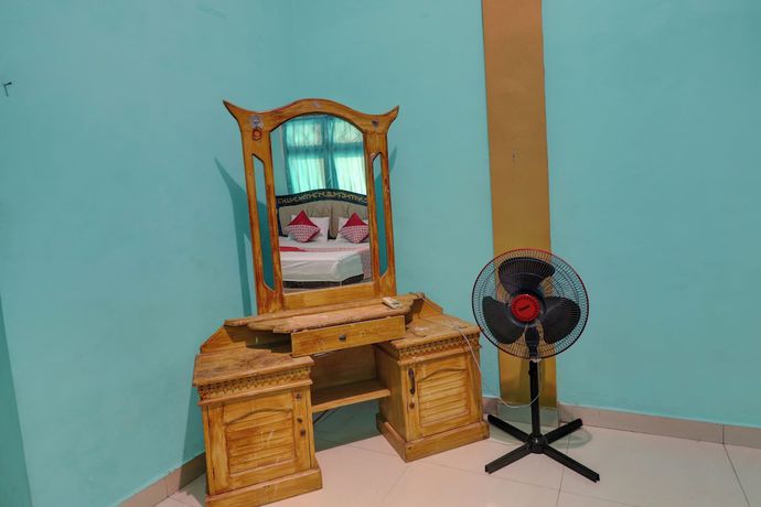 Imagen de la habitación del Hotel Hotel O Rania Kost Simpang Rimbo. Foto 12