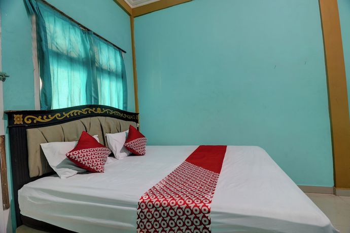 Imagen de la habitación del Hotel Hotel O Rania Kost Simpang Rimbo. Foto 15