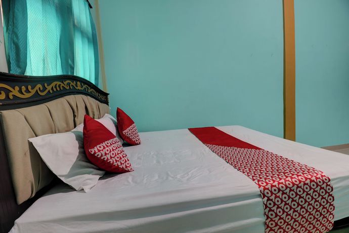 Imagen de la habitación del Hotel Hotel O Rania Kost Simpang Rimbo. Foto 16