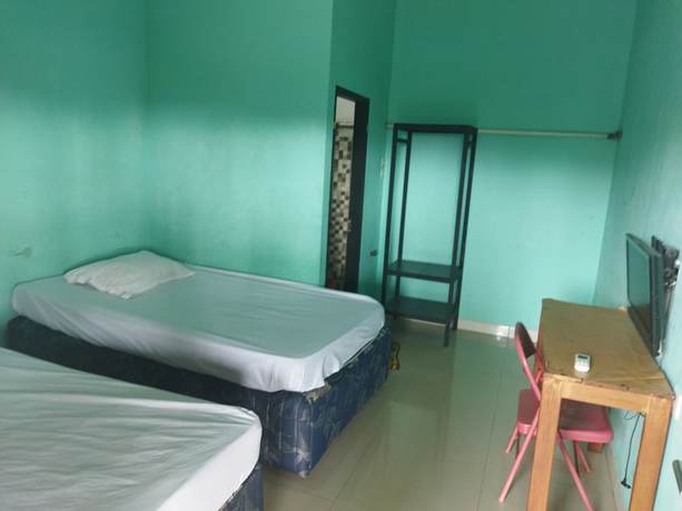 Imagen de la habitación del Hotel Hotel O Rinjani Guest House. Foto 3