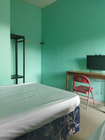 Imagen de la habitación del Hotel Hotel O Rinjani Guest House. Foto 4