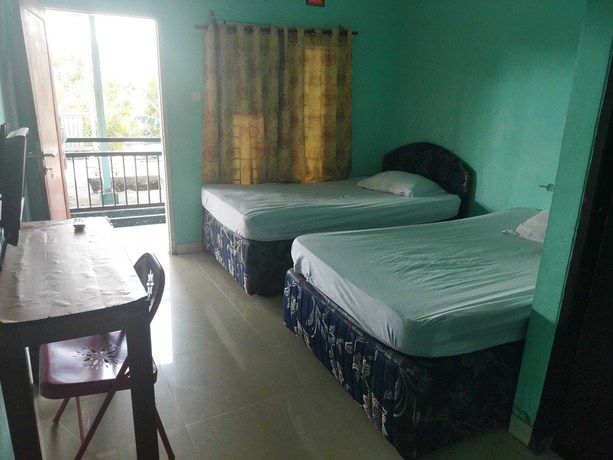 Imagen de la habitación del Hotel Hotel O Rinjani Guest House. Foto 5