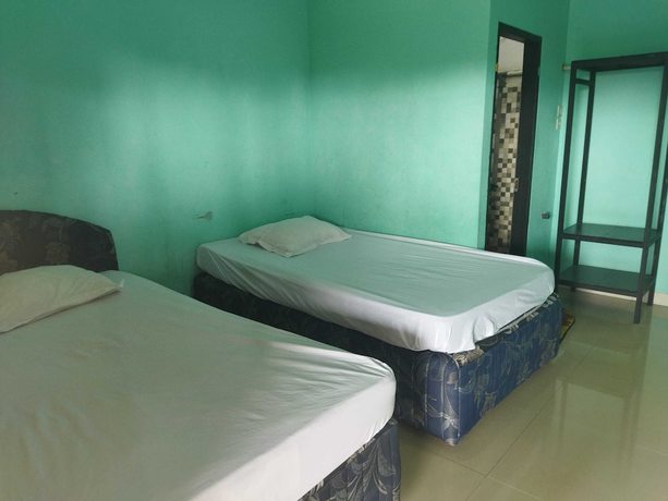 Imagen de la habitación del Hotel Hotel O Rinjani Guest House. Foto 6