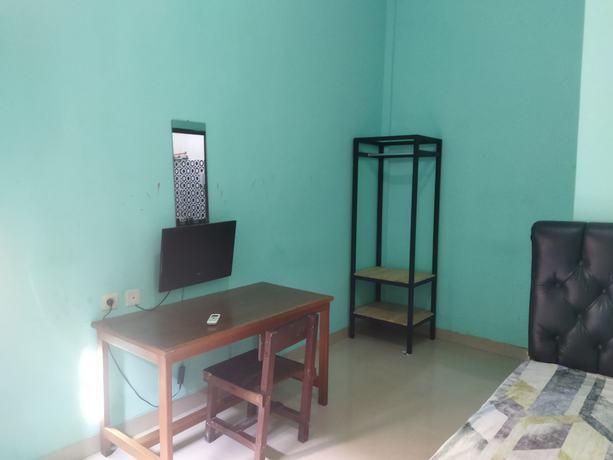 Imagen de la habitación del Hotel Hotel O Rinjani Guest House. Foto 7