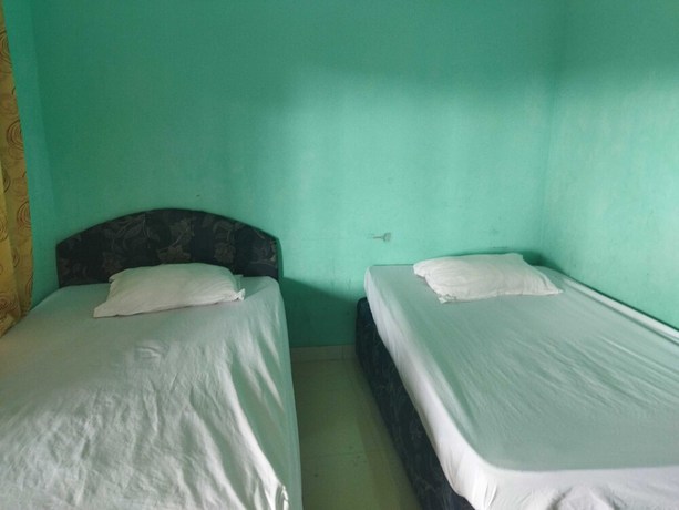 Imagen de la habitación del Hotel Hotel O Rinjani Guest House. Foto 9