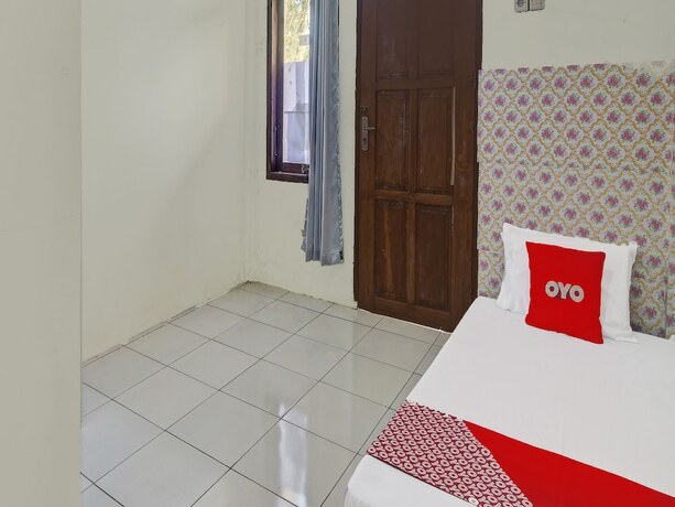 Imagen de la habitación del Hotel Hotel O Sosonopan Homestay Near LANTAMAL VIII MANADO. Foto 19