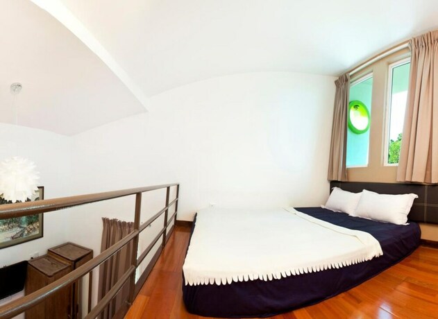 Imagen de la habitación del Hotel Hotel O Vince Villa. Foto 4