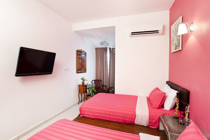 Imagen de la habitación del Hotel Hotel O Vince Villa. Foto 5