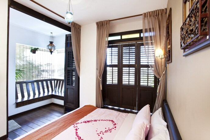 Imagen de la habitación del Hotel Hotel O Vince Villa. Foto 8