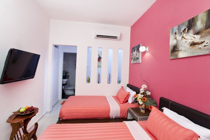 Imagen de la habitación del Hotel Hotel O Vince Villa. Foto 16