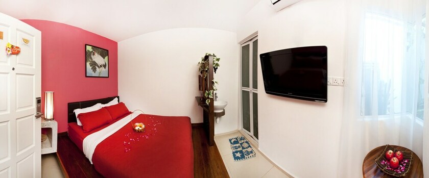Imagen de la habitación del Hotel Hotel O Vince Villa. Foto 17