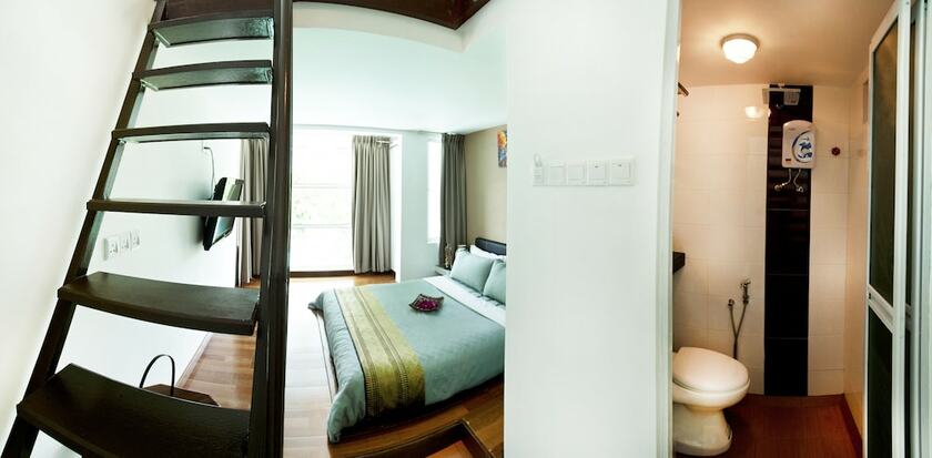 Imagen de la habitación del Hotel Hotel O Vince Villa. Foto 18