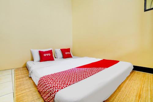 Imagen de la habitación del Hotel Hotel O Wisma Al-fahmi Syariah. Foto 15
