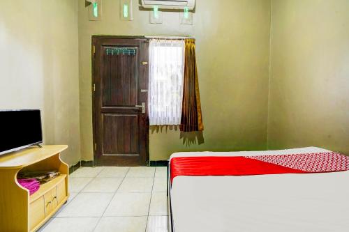 Imagen de la habitación del Hotel Hotel O Wisma Al-fahmi Syariah. Foto 17