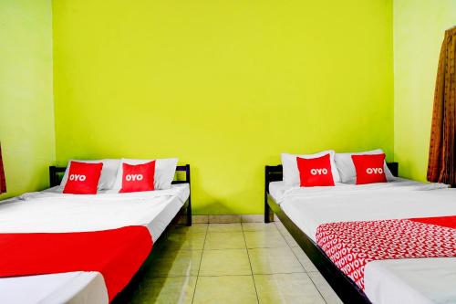 Imagen de la habitación del Hotel Hotel O Wisma Al-fahmi Syariah. Foto 18