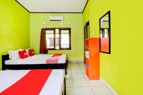 Imagen de la habitación del Hotel Hotel O Wisma Al-fahmi Syariah. Foto 19