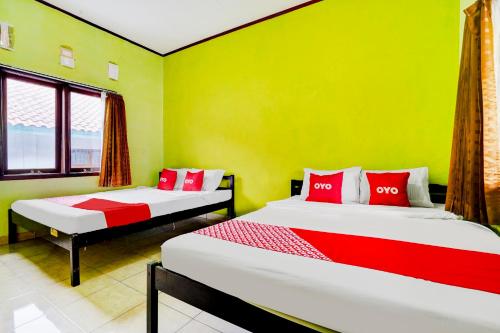 Imagen de la habitación del Hotel Hotel O Wisma Al-fahmi Syariah. Foto 20