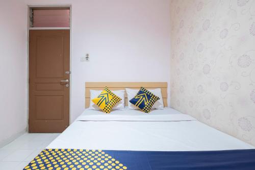 Imagen de la habitación del Hotel Hotel O Wisma Jampea. Foto 20