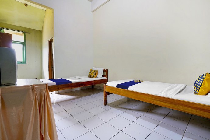 Imagen de la habitación del Hotel Hotel O Wisma Lec Syariah. Foto 9