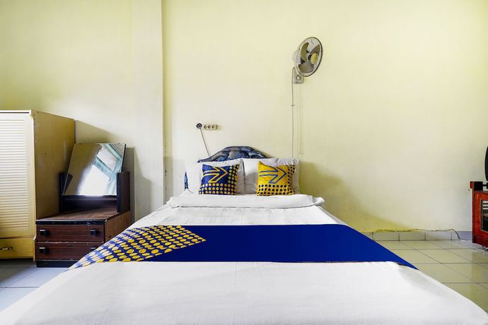Imagen de la habitación del Hotel Hotel O Wisma Lec Syariah. Foto 11