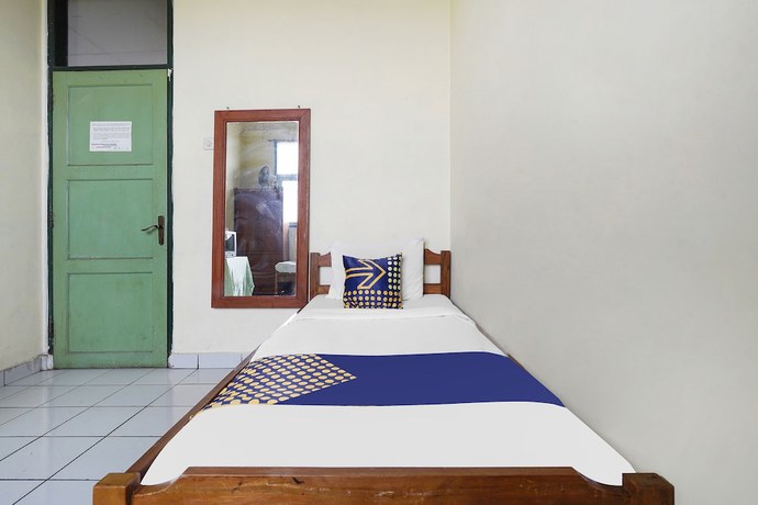 Imagen de la habitación del Hotel Hotel O Wisma Lec Syariah. Foto 16