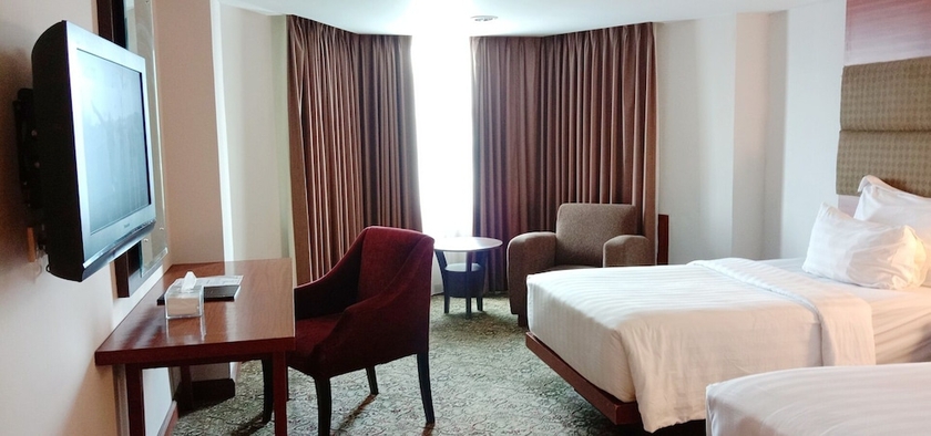 Imagen de la habitación del Hotel Hotel Pangeran Pekanbaru. Foto 14