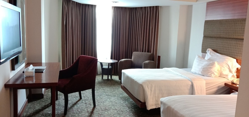 Imagen de la habitación del Hotel Hotel Pangeran Pekanbaru. Foto 15