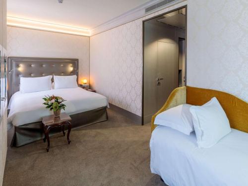 Imagen de la habitación del Hotel Hotel Papadopoli Venezia - MGallery Collection. Foto 10