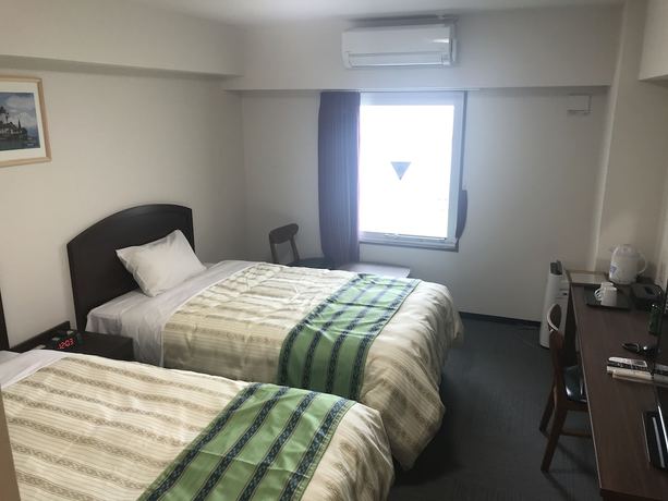 Imagen de la habitación del Hotel Hotel Peace Island Nago. Foto 6
