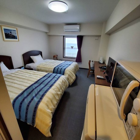 Imagen de la habitación del Hotel Hotel Peace Island Nago. Foto 8