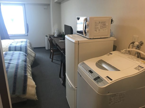 Imagen de la habitación del Hotel Hotel Peace Island Nago. Foto 12