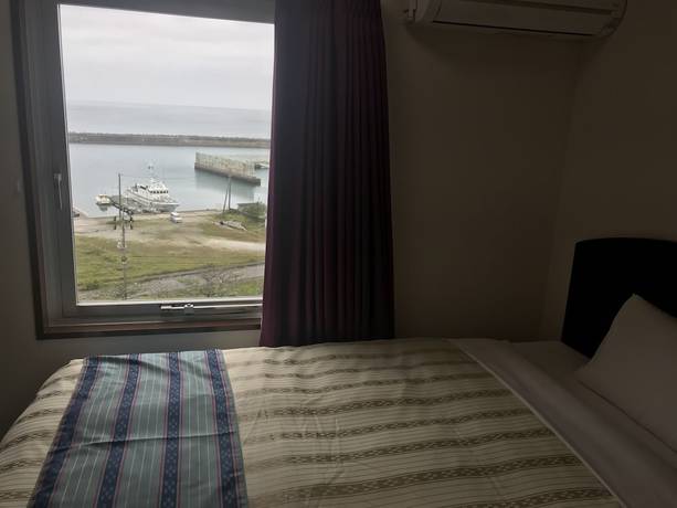 Imagen de la habitación del Hotel Hotel Peace Island Nago. Foto 15