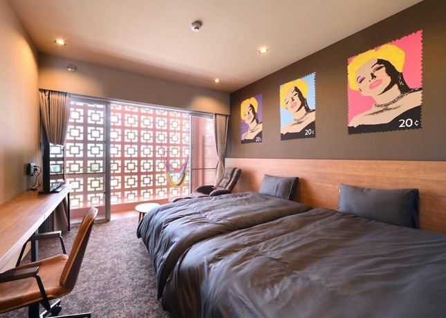 Imagen de la habitación del Hotel Hotel Pink Hibiscus. Foto 15