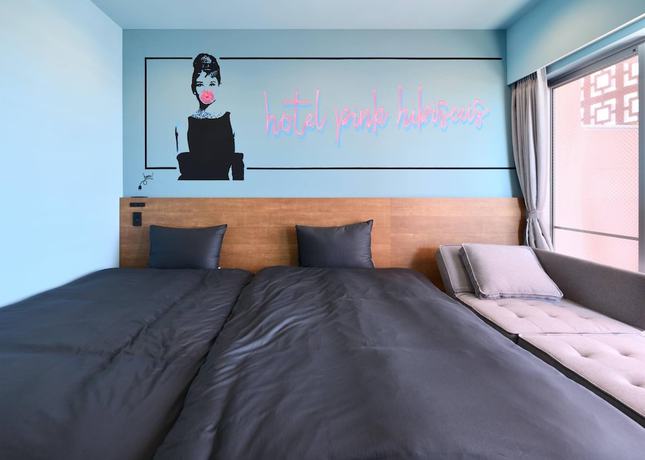 Imagen de la habitación del Hotel Hotel Pink Hibiscus. Foto 19