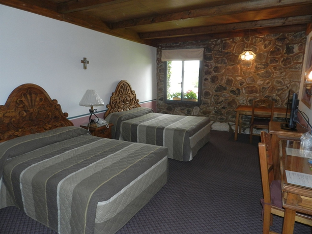 Imagen de la habitación del Hotel Hotel Posada La Aldea. Foto 7
