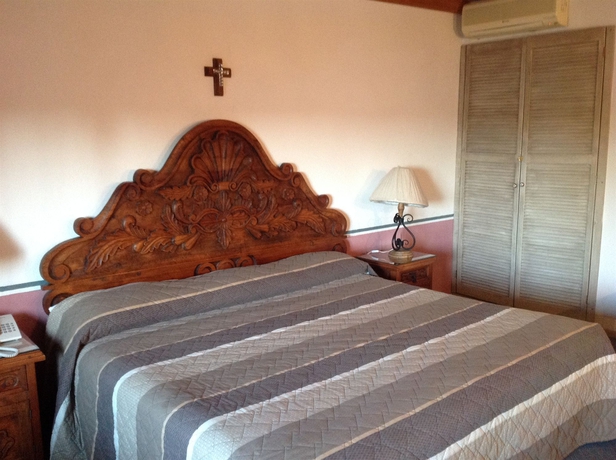 Imagen de la habitación del Hotel Hotel Posada La Aldea. Foto 12