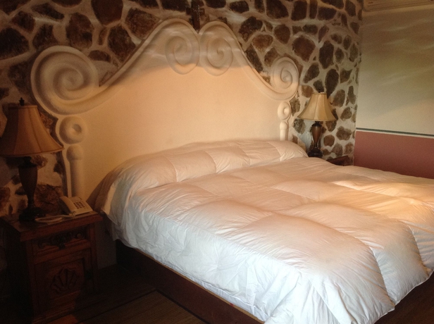 Imagen de la habitación del Hotel Hotel Posada La Aldea. Foto 13