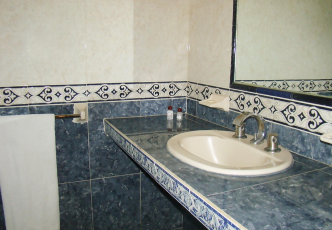 Imagen de la habitación del Hotel Hotel Posada La Fuente. Foto 9