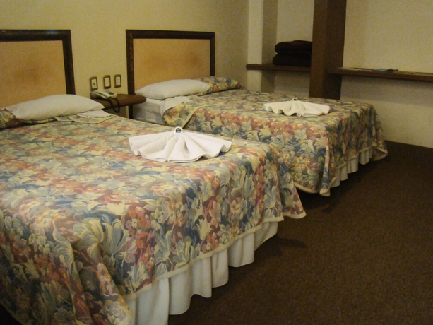 Imagen de la habitación del Hotel Hotel Posada La Fuente. Foto 11